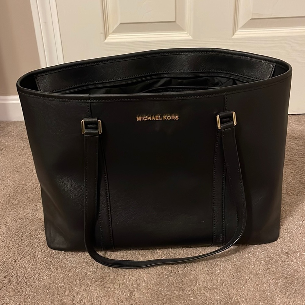 Michael Kors zippered purse with laptop sleeve